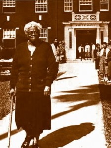 Dr. Mary Bethune in front of White Hall on the campus of Bethune-Cookman College in Daytona Beach, Florida 